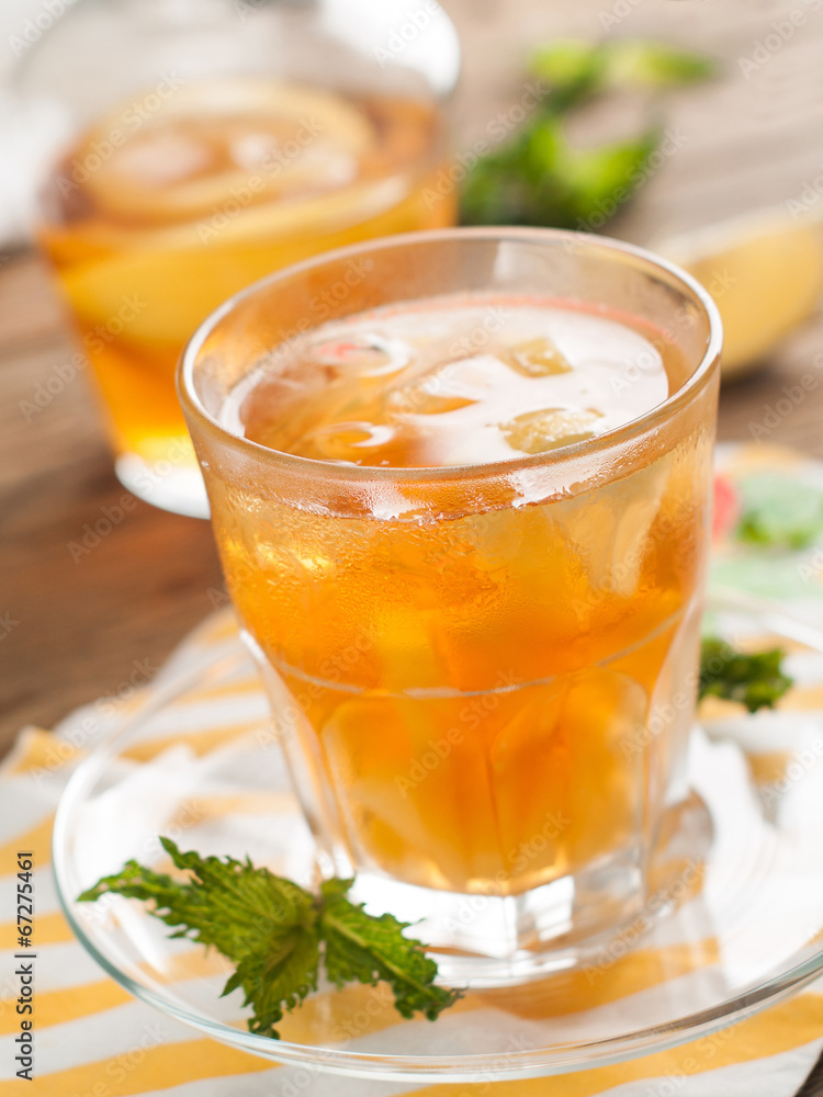 Iced tea with lemon slices, selective focus Iced tea with lemon slices, selective focus