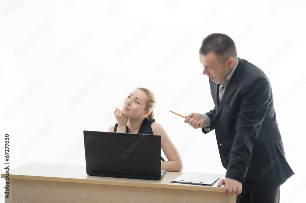 Colleagues discussing something sitting by computer Colleagues discussing something sitting by computer