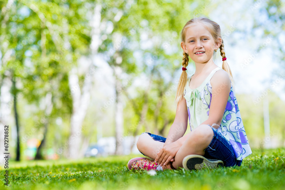 portrait of a smiling girl in a park portrait of a smiling girl in a park