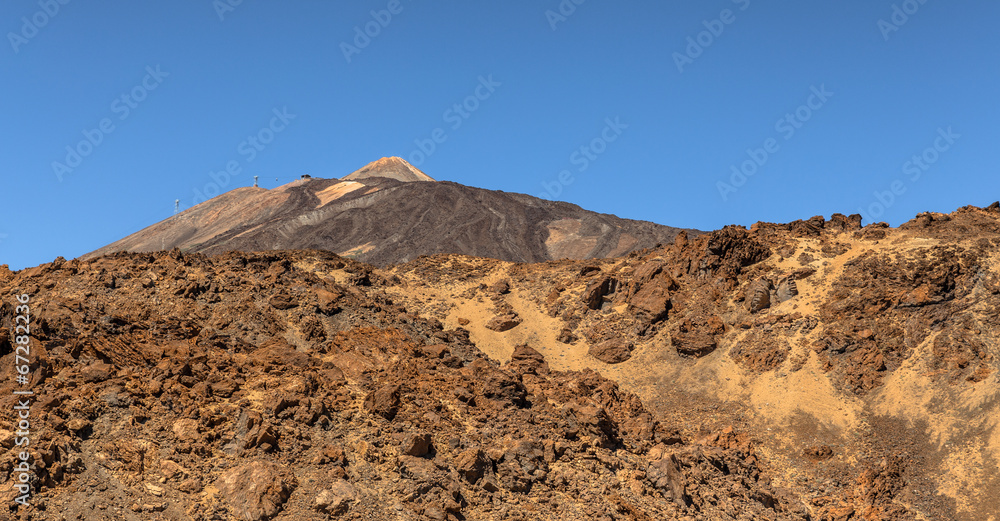 Teide volcano behind rocks in Tenerife
