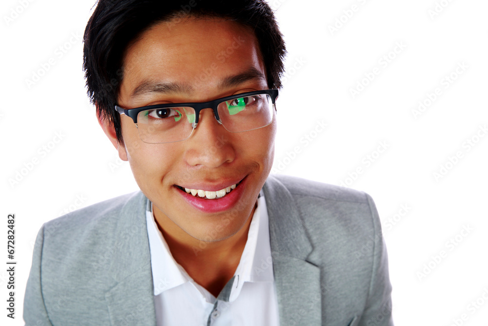 Closeup portrait of a cheerful asian man over white background Closeup portrait of a cheerful asian man over white background