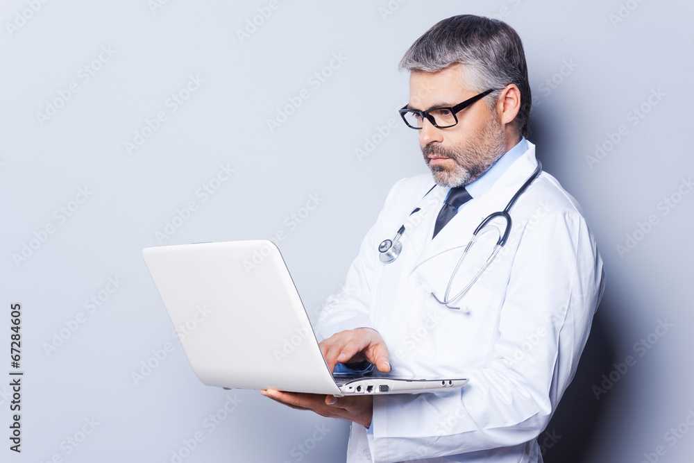 Doctor with laptop. Doctor with laptop.