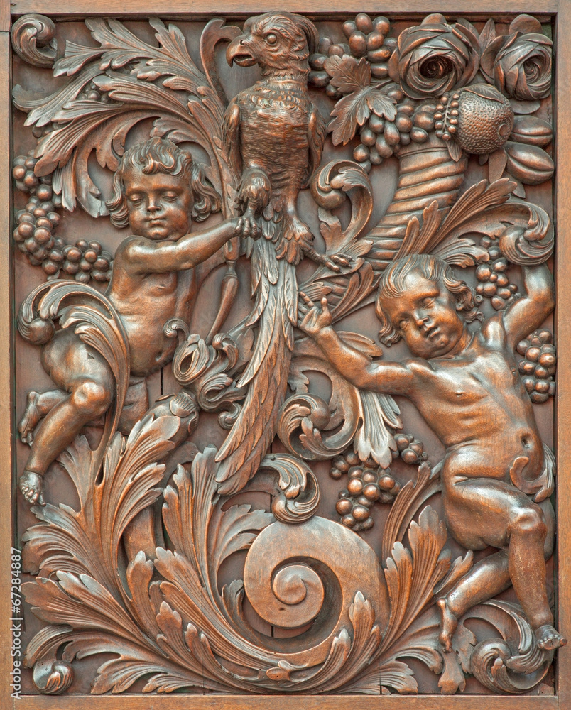 Beruges - carved relief of angels with the bird