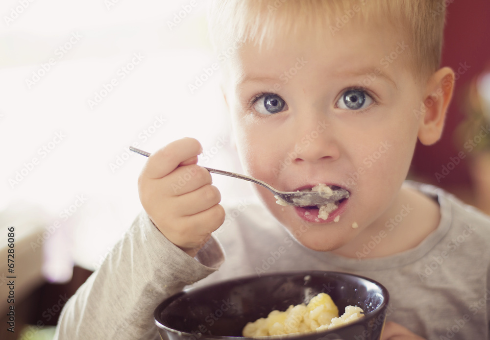 Little boy eating Little boy eating