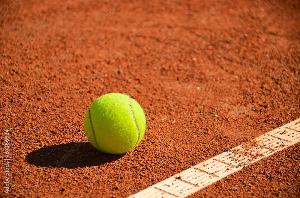 tennis ball near markup diagonal horizontal