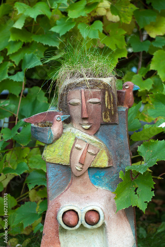the flower pot in the form of the feminine head photo