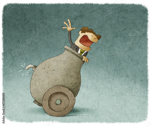 Businessman inside a cannon