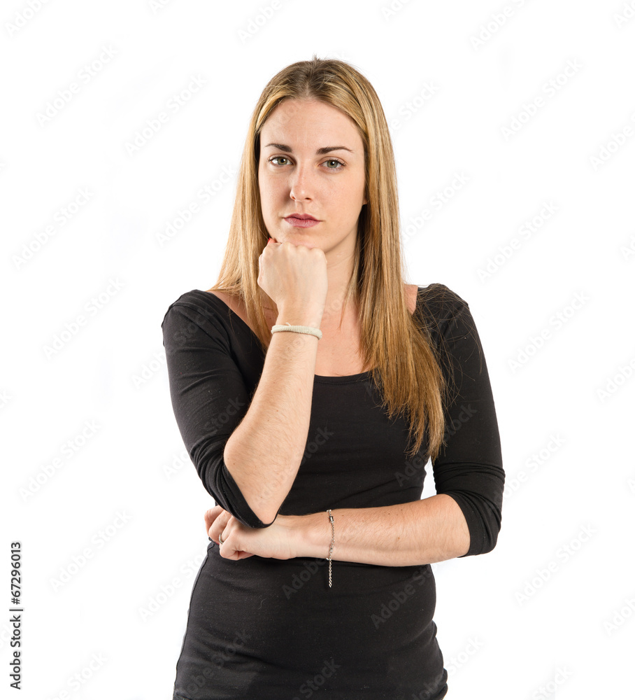 Blonde girl thinking over isolated white background Blonde girl thinking over isolated white background