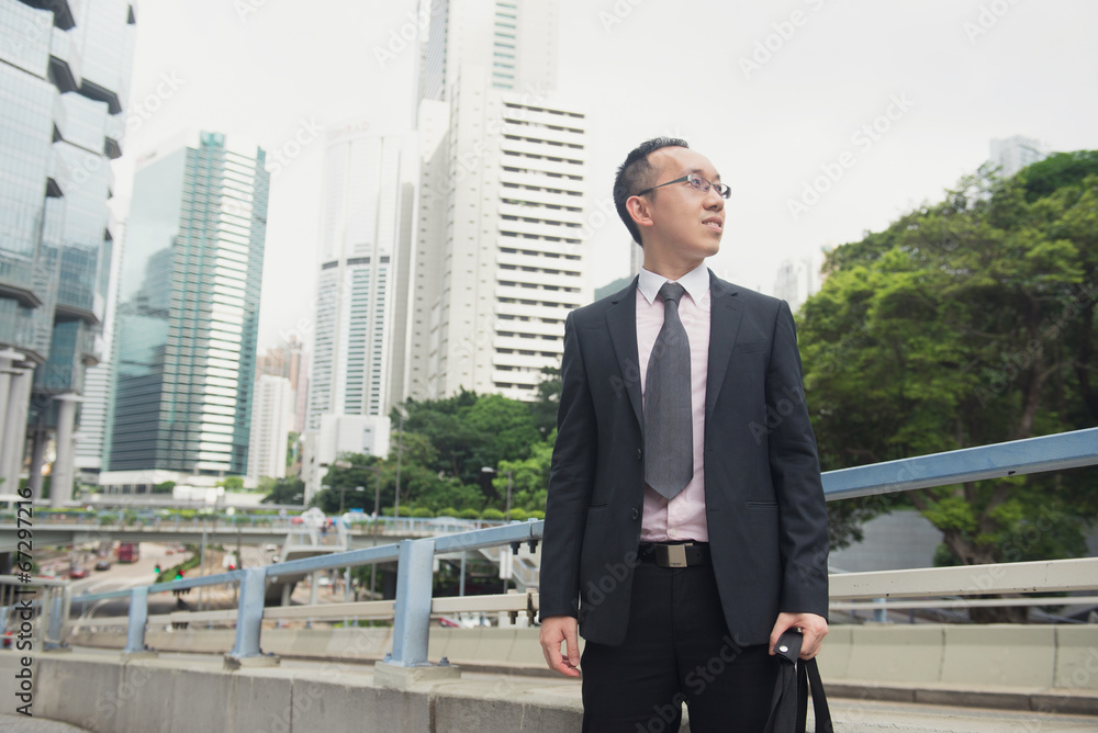 hong kong businessman in busy central district street hong kong businessman in busy central district street