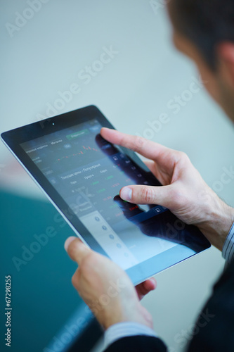 men holding digital tablet