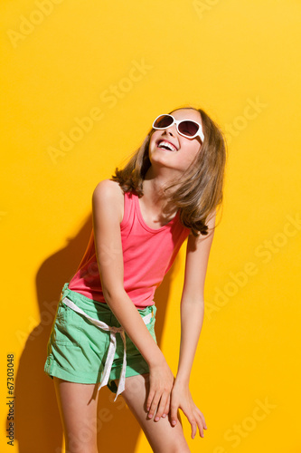 Laughing girl in sunlight