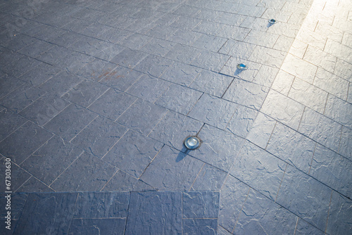 Pavement hardscape design with reflected road stud
