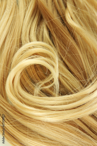 Curly blond hair close-up background
