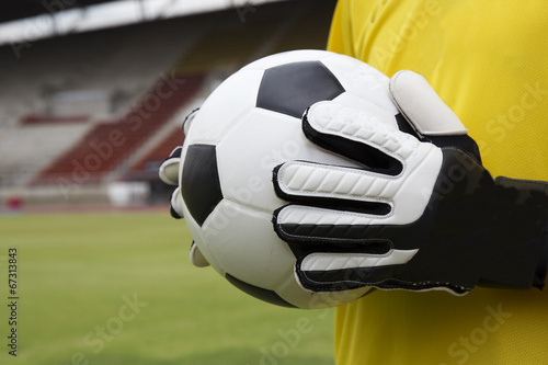 soccer goalkeeper with ball