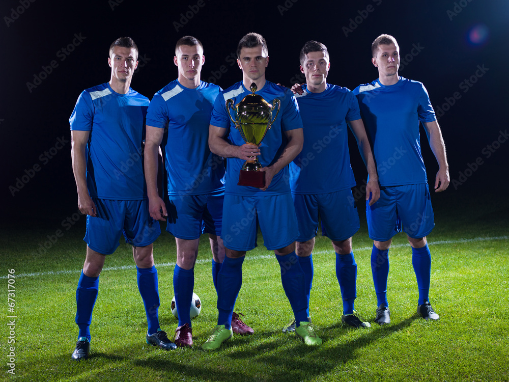 Fototapeta premium soccer players celebrating victory