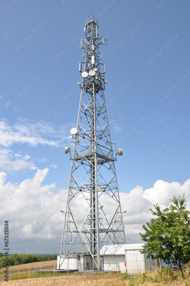 Telecommunication tower with cell phone antennas 