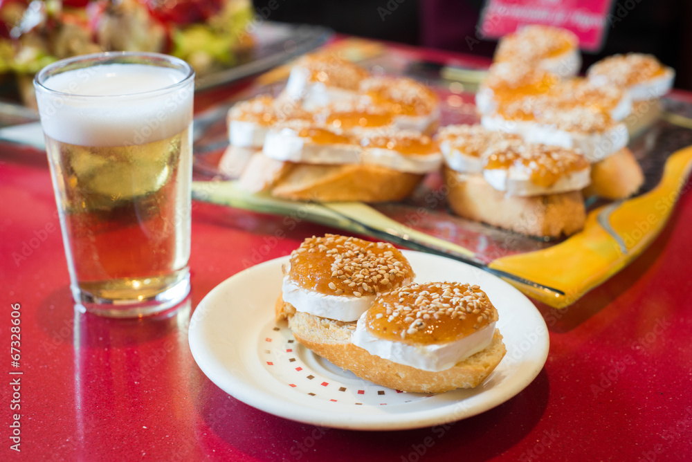 Pinchos, traditional Basque Country appetizer. Served with beer