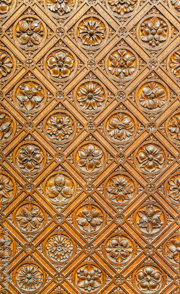 Pattern of flower carved on wood