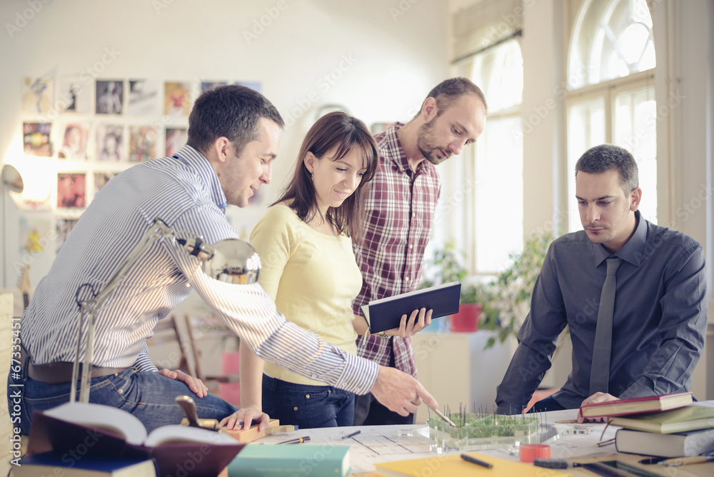Group of Architects with teacher working at project Group of Architects with teacher working at project