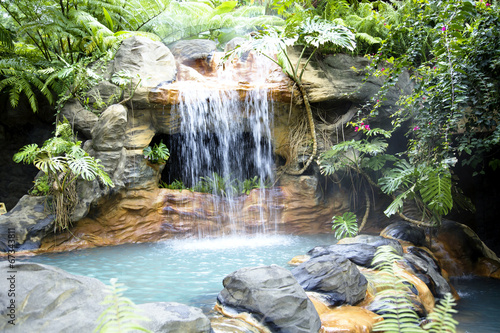 Little pool with a waterfall and hot thermal water, Costa Rica