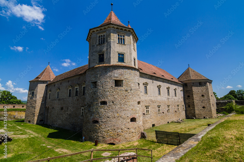 Medieval castle and it's water reflection, Fagaras, Romania