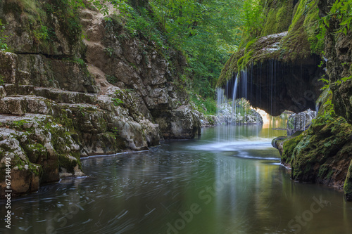 Bigar Cascade Falls in Beusnita Gorges National Park, Romania