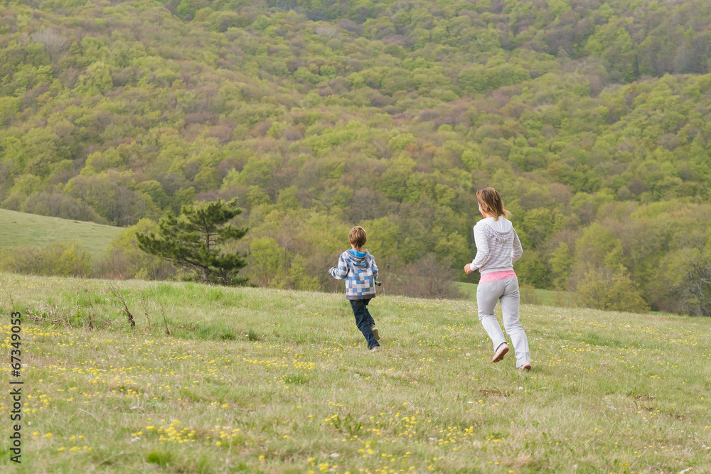 happy family enjoying free time on natural background happy family enjoying free time on natural background