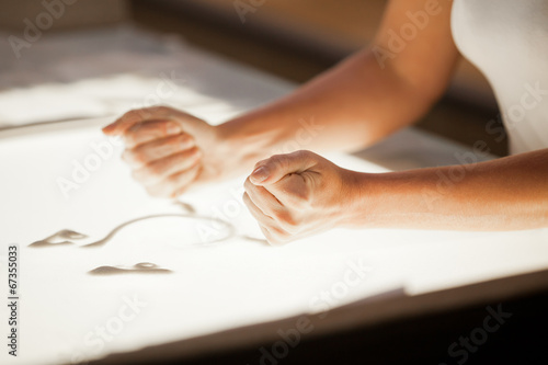 Sand animation. Hands girls draw sand