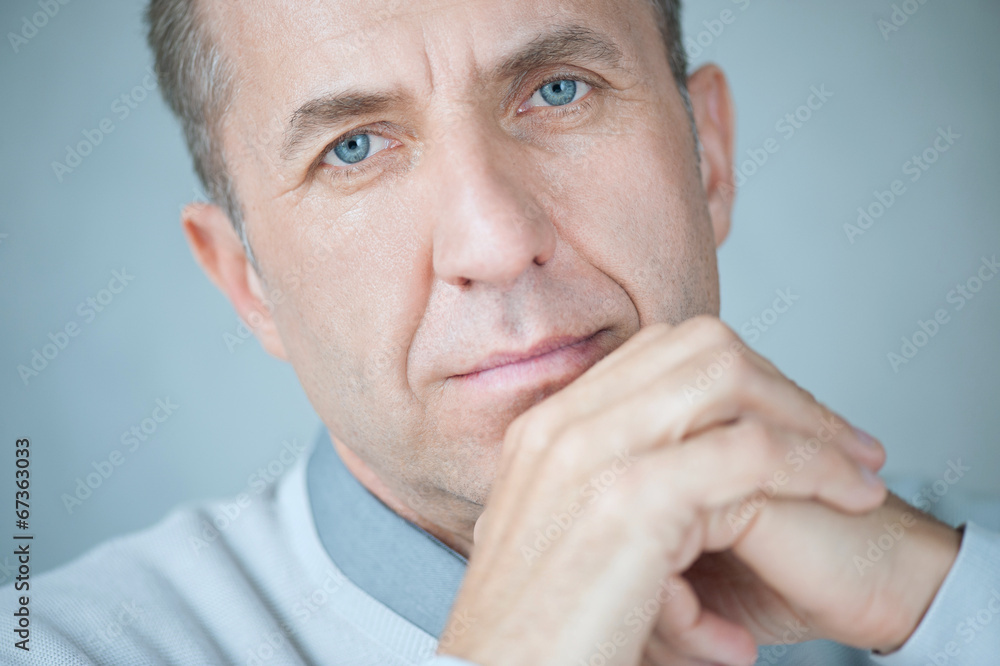 Portrait of caucasian serious and mature business man. Portrait of caucasian serious and mature business man.