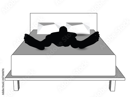 silhouette of a man in bed