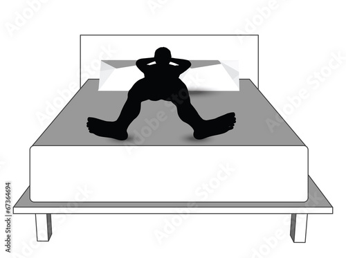 silhouette of a man in bed