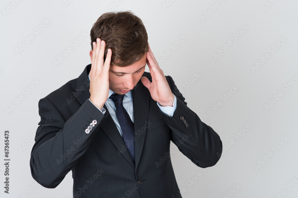 handsome business man in suit has headache handsome business man in suit has headache