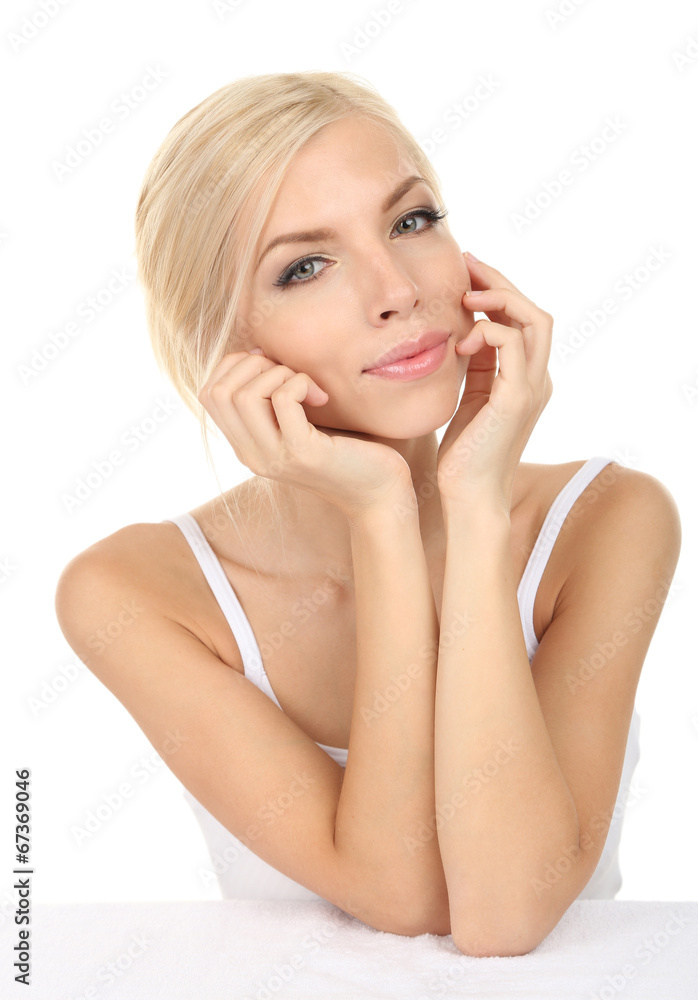 Beautiful young woman isolated on white