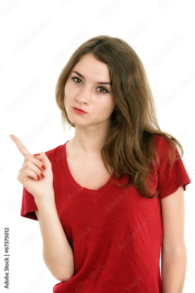 Young smiling woman points a hand with positive facial expressio Young smiling woman points a hand with positive facial expressio