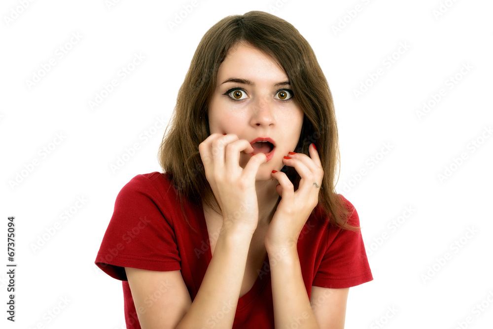 Shocked girl covers her mouth with hands, isolated on white Shocked girl covers her mouth with hands, isolated on white