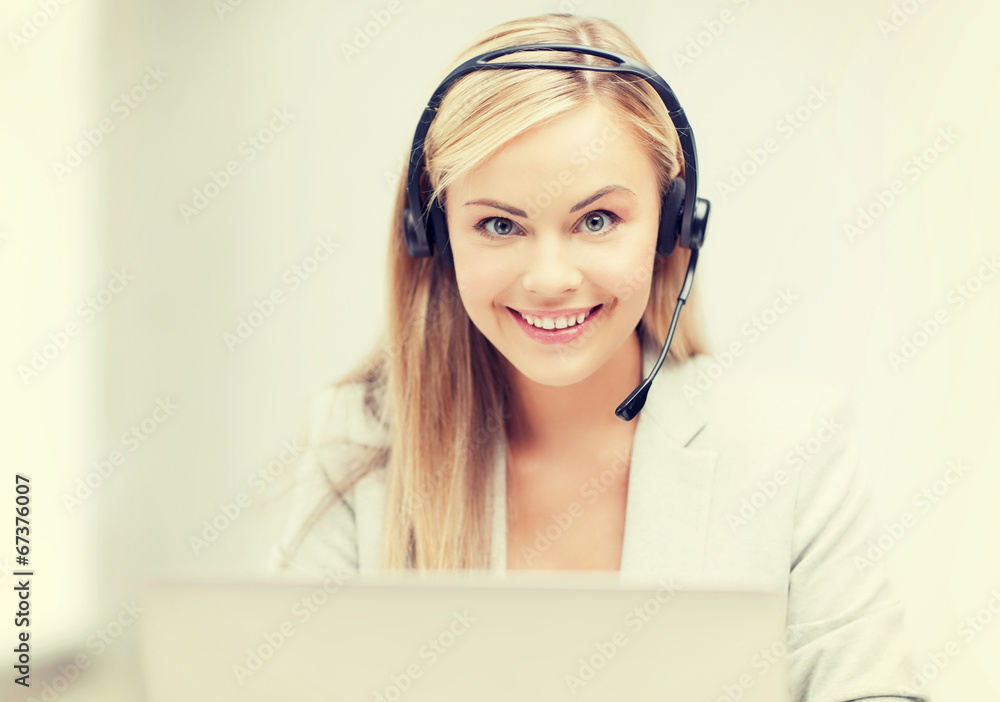 friendly female helpline operator with laptop friendly female helpline operator with laptop