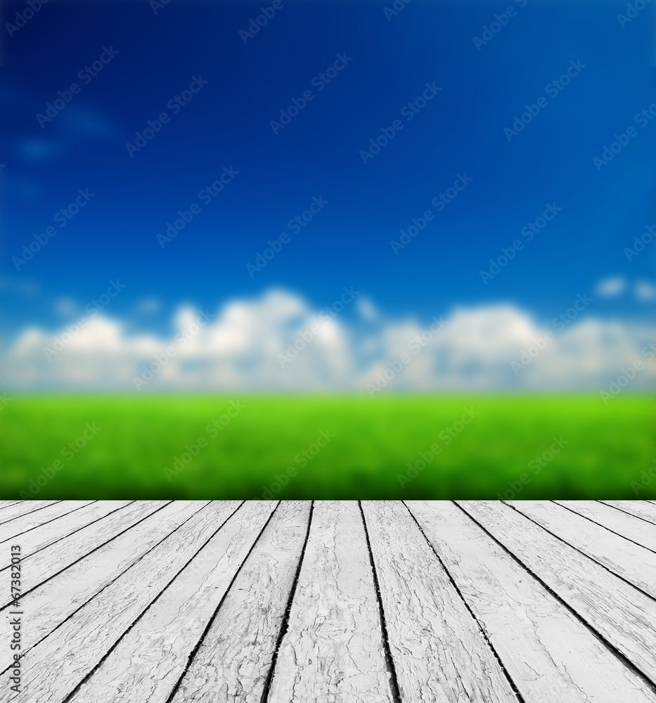 Wood, blue sea and sky background