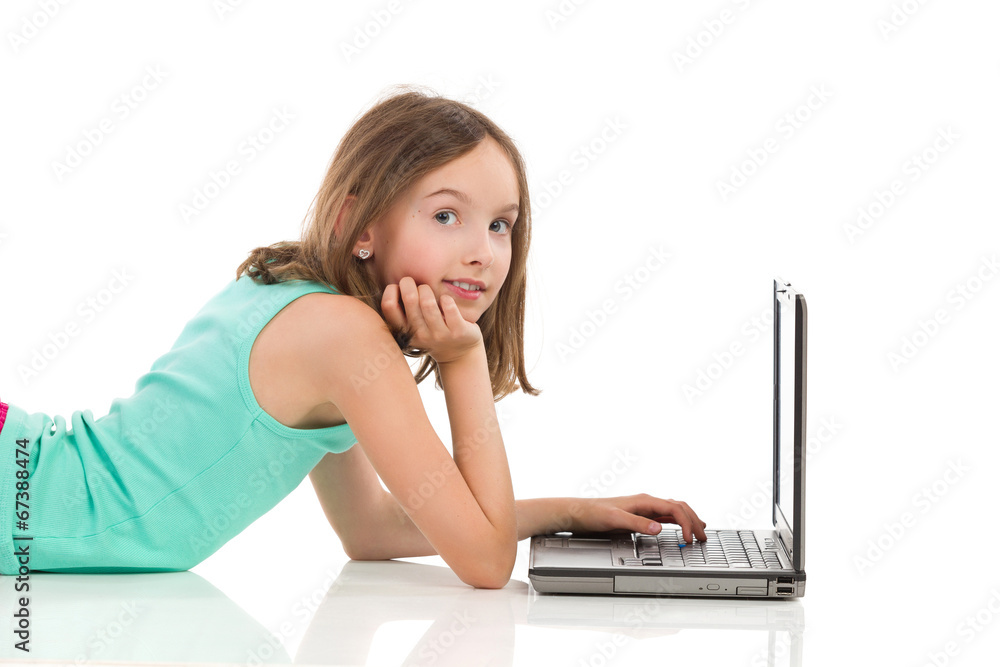 Teen girl using laptop Teen girl using laptop