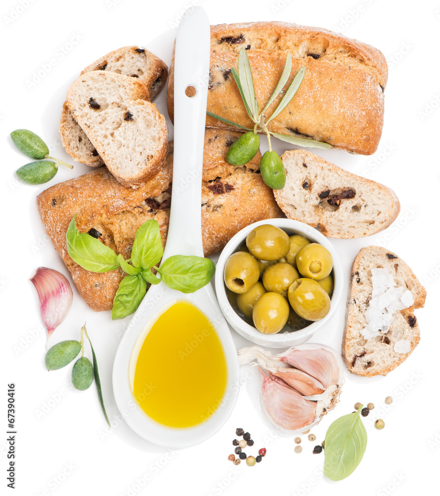 Olive bread, olive fruits and oil from top view Olive bread, olive fruits and oil from top view