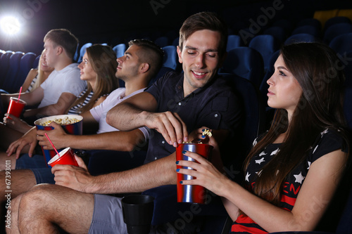 Young people watching movie...