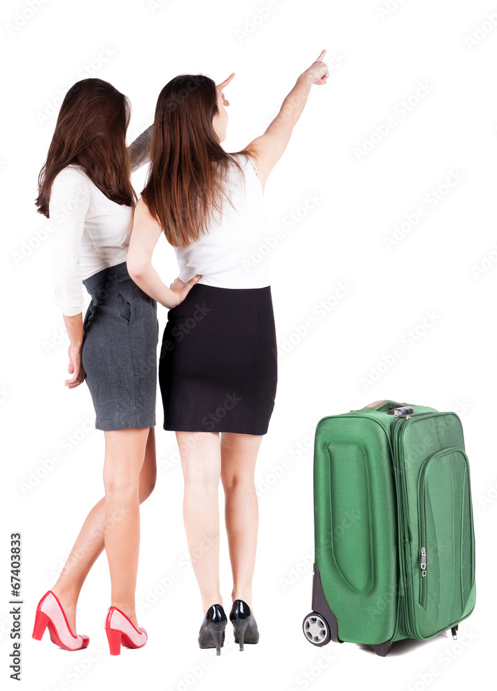 back view of businessteam traveling with suitcas. back view of businessteam traveling with suitcas.