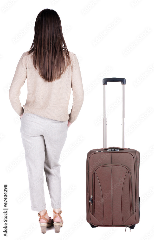 back view of standing young beautiful brunette woman. back view of standing young beautiful brunette woman.