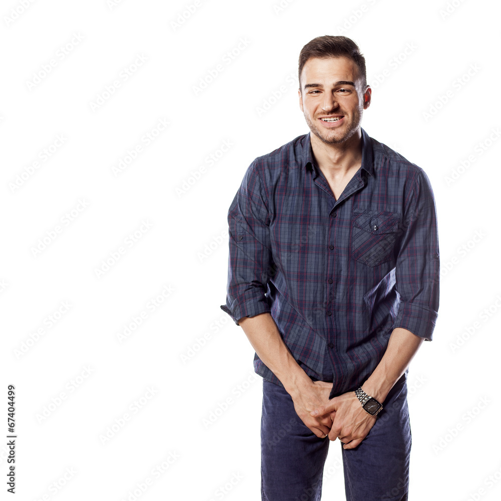 Fototapeta premium handsome man with a funny face hold his genitals