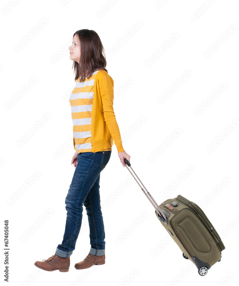front view of walking woman with suitcase. front view of walking woman with suitcase.
