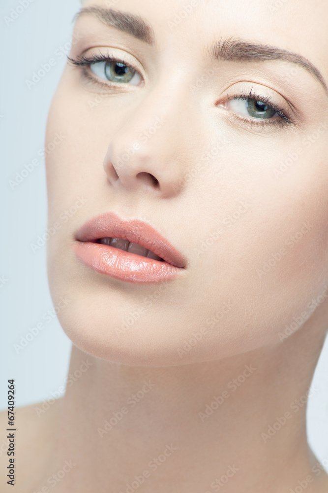 Closeup portrait of young beautiful green eyed woman Closeup portrait of young beautiful green eyed woman