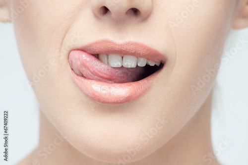 Closeup portrait of young beautiful green eyed woman