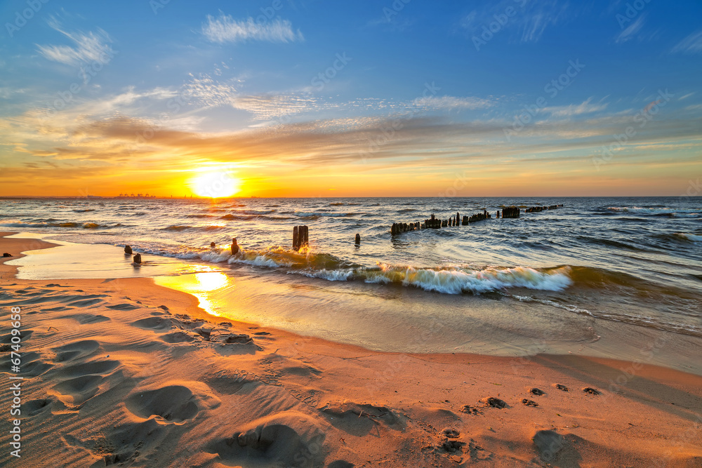 Sunset on the beach at Baltic Sea in Poland - obrazy, fototapety, plakaty 