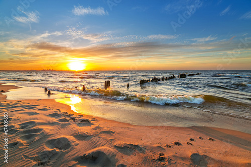 Sunset on the beach at Baltic Sea in Poland