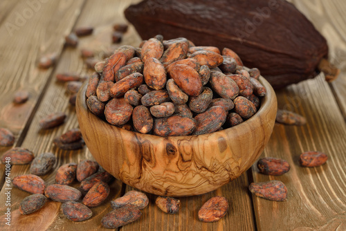 Cocoa beans in a wooden bowl