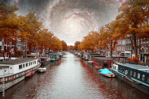 amsterdam autumn night. Elements of this image furnished by NASA
